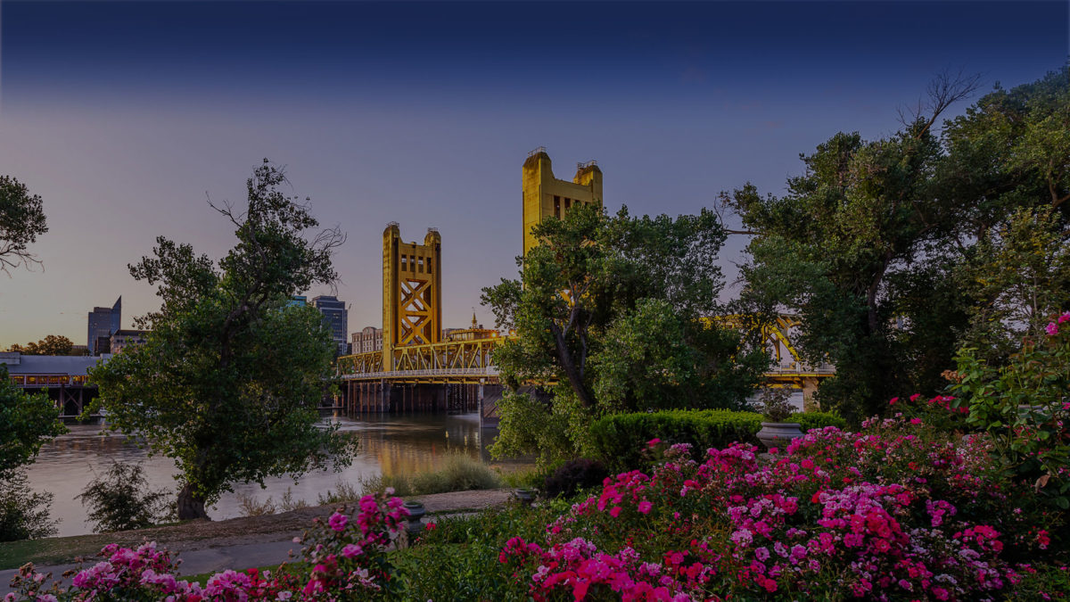 The sun rises over the historical landmarks of West Sacramento, California.